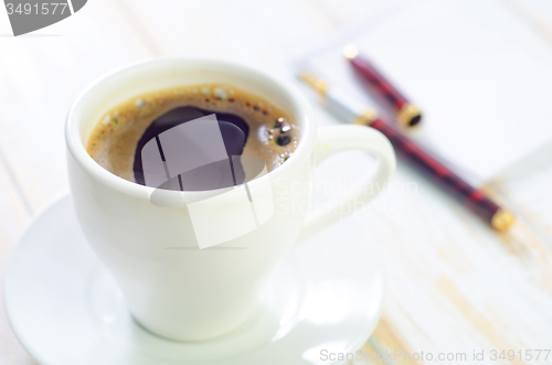 Image of coffee and note