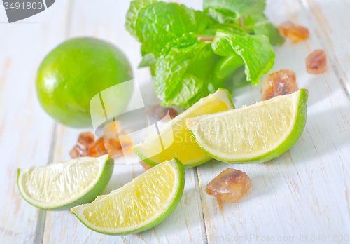 Image of lime with mint and sugar