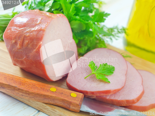 Image of Ham on wooden board