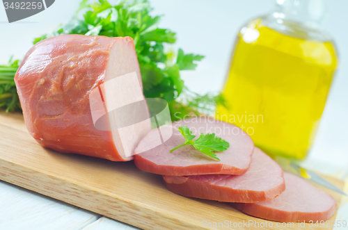 Image of Ham on wooden board