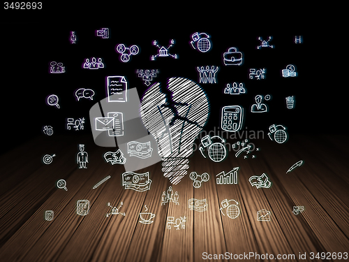 Image of Business concept: Light Bulb in grunge dark room