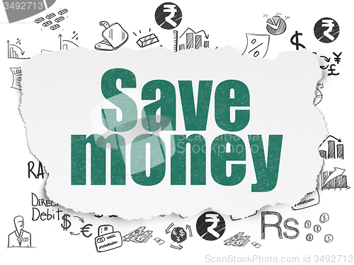 Image of Currency concept: Save Money on Torn Paper background