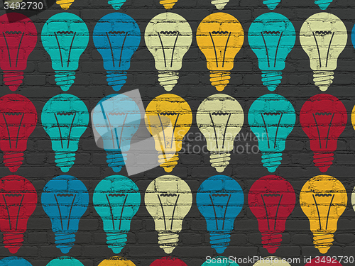 Image of Business concept: Light Bulb icons on wall background