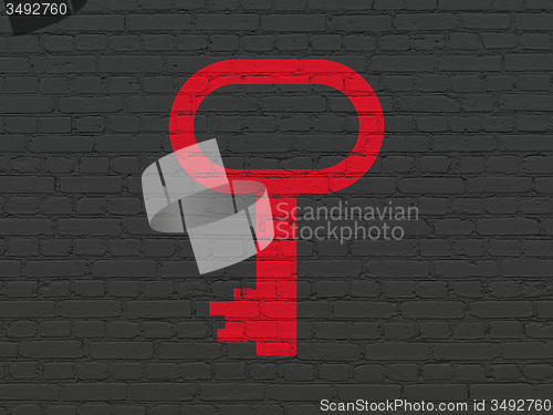 Image of Security concept: Key on wall background