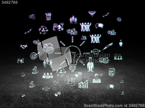 Image of Business concept: Light Bulb in grunge dark room