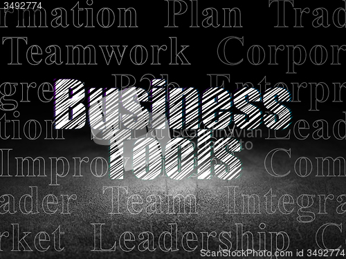Image of Business concept: Business Tools in grunge dark room