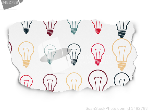 Image of Finance concept: Light Bulb icons on Torn Paper background