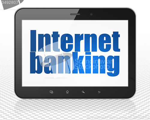 Image of Currency concept: Tablet Pc Computer with Internet Banking on display