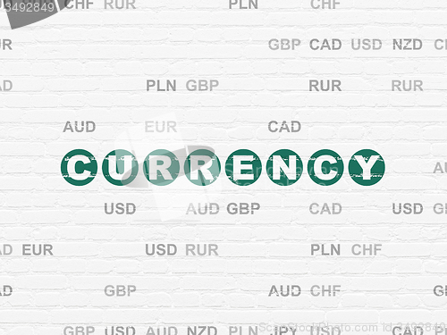 Image of Money concept: Currency on wall background