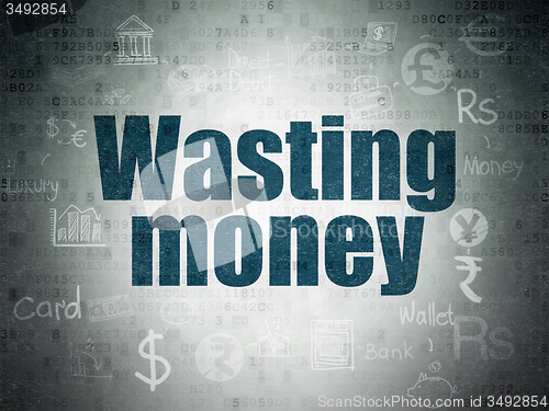 Image of Money concept: Wasting Money on Digital Paper background