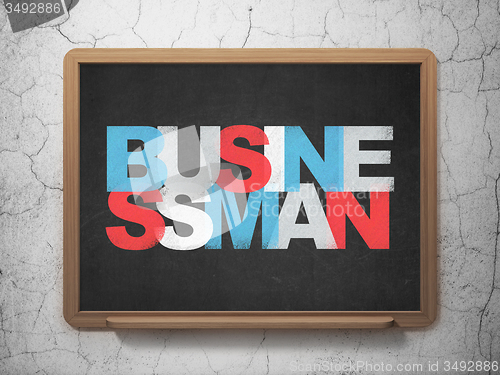 Image of Finance concept: Businessman on School Board background