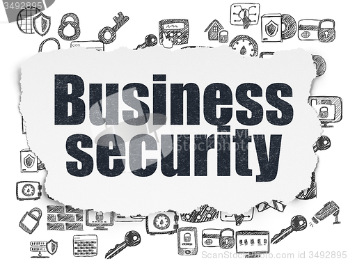 Image of Security concept: Business Security on Torn Paper background