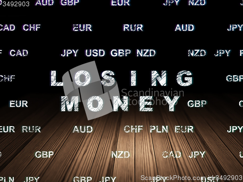 Image of Banking concept: Losing Money in grunge dark room