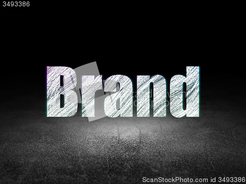 Image of Advertising concept: Brand in grunge dark room