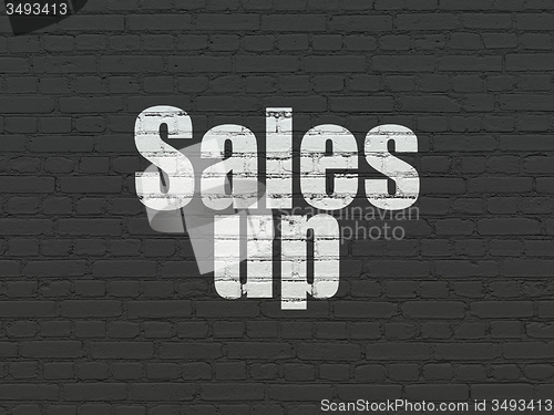 Image of Marketing concept: Sales Up on wall background