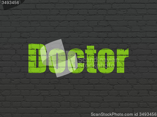 Image of Health concept: Doctor on wall background