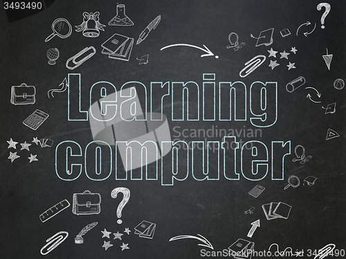 Image of Education concept: Learning Computer on School Board background