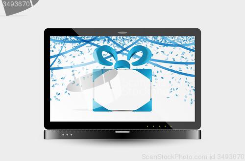 Image of gift with ribbons and confetti on laptop screen