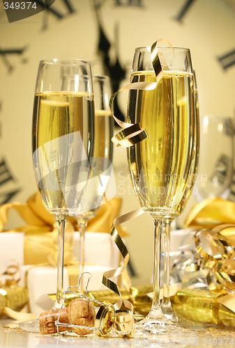 Image of Glasses of champagne ready to celebrate