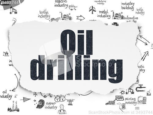 Image of Manufacuring concept: Oil Drilling on Torn Paper background