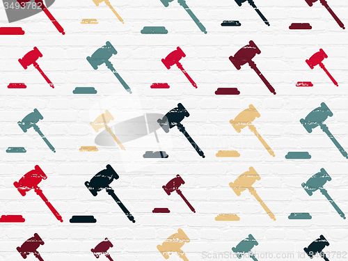 Image of Law concept: Gavel icons on wall background
