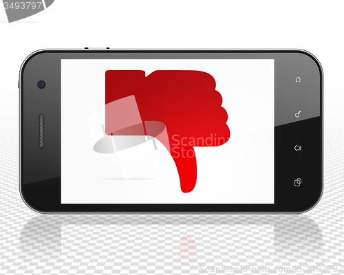 Image of Social network concept: Smartphone with Thumb Down on display