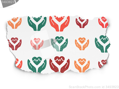 Image of Insurance concept: Heart And Palm icons on Torn Paper background
