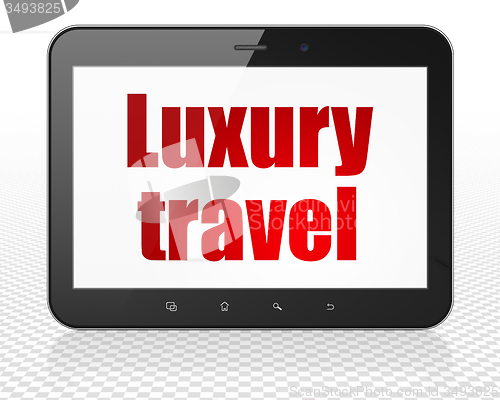 Image of Tourism concept: Tablet Pc Computer with Luxury Travel on display