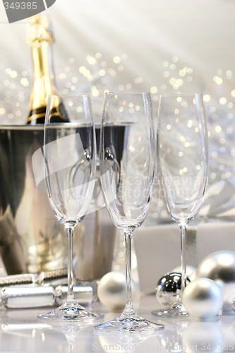 Image of Three empty champagne glasses ready to be filled