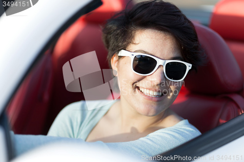 Image of Woman Driving a Convertible