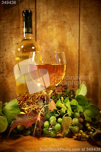 Image of Wine glass with bottle