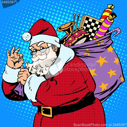 Image of Santa Claus with gift bag okay gesture