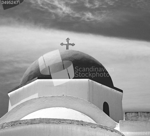 Image of in europe greece a cross the cloudy sky