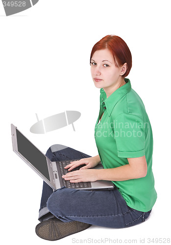 Image of Redheaded girl with a laptop