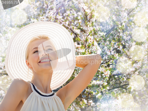 Image of beautiful woman enjoying summer outdoors