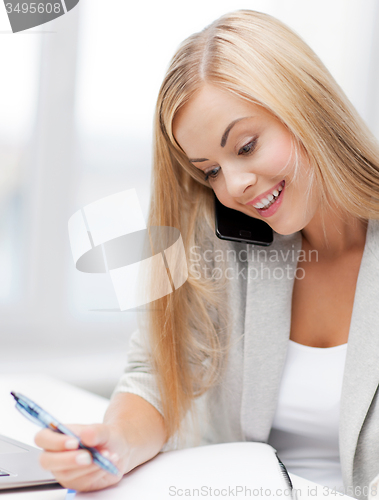 Image of businesswoman with phone