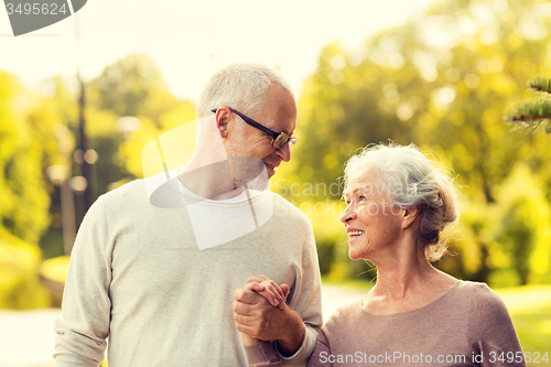 Image of senior couple in city park