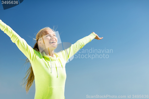 Image of woman doing sports outdoors