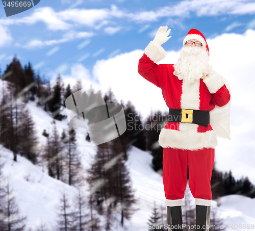 Image of man in costume of santa claus with bag