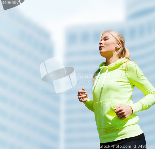 Image of woman doing running outdoors