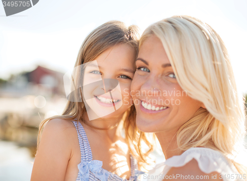 Image of happy mother and child girl