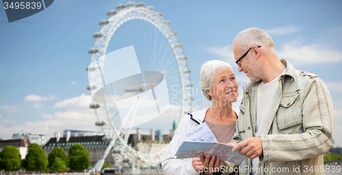 Image of senior couple with map talking over london