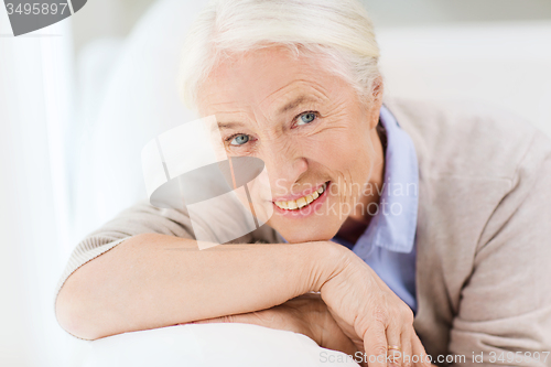 Image of happy senior woman face at home