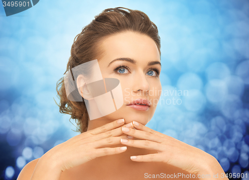 Image of beautiful young woman with manicure
