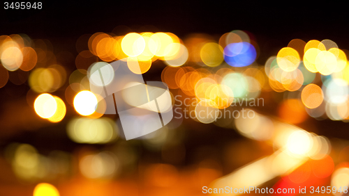 Image of golden bright lights on dark night background