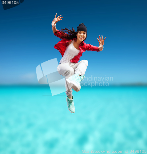 Image of beautiful dancing girl jumping