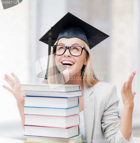 Image of happy student in graduation cap