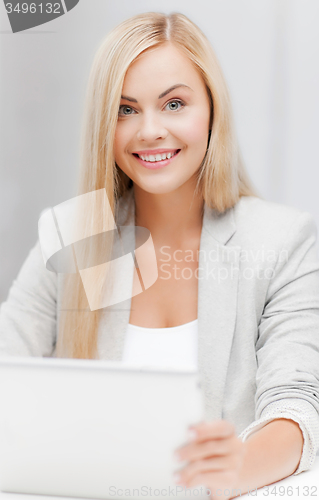 Image of businesswoman with laptop