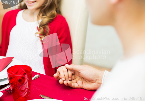 Image of close up of family having christmas dinner at home