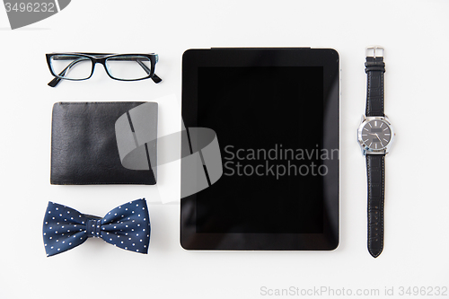 Image of tablet pc and hipster personal stuff